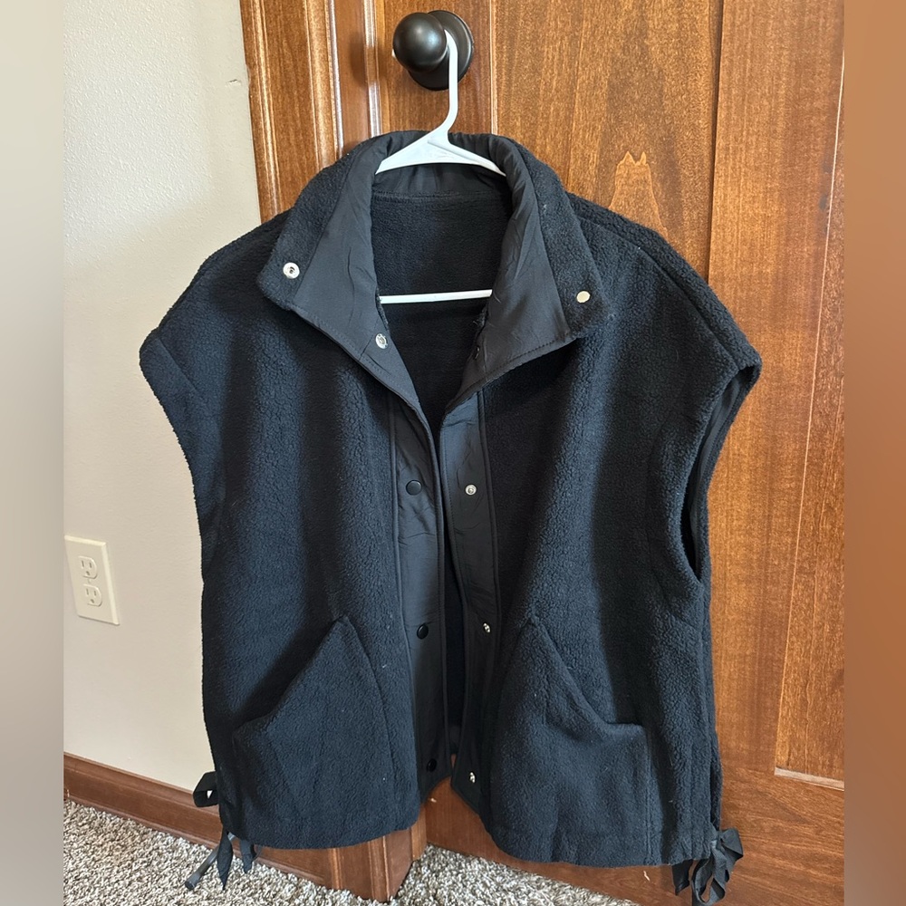 black fleece vest with side ties